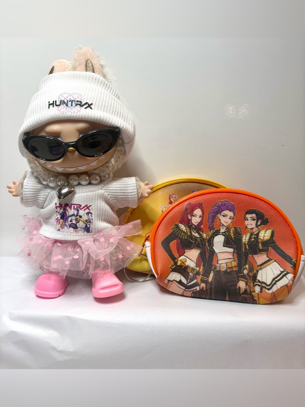 6 Piece Huntrix Outfit. Fits Labubus. Plus 2 Coin Bags. Doll NOT included.